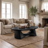 Calyven Oval-Top Sculpted Handcrafted Coffee Table by Timberustic — Black finish