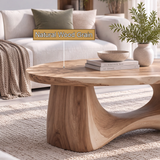 Calyven Oval-Top Sculpted Handcrafted Coffee Table by Timberustic — natural wood grain detail